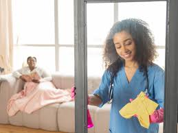 Caregiver doing light cleaning